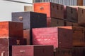 Pile of old vintage big wooden boxes stacked in a furniture store Royalty Free Stock Photo