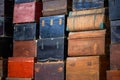 Pile of old vintage big wooden boxes stacked in a furniture store Royalty Free Stock Photo