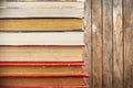 Pile of old vintage books, wooden background