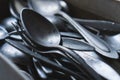 Pile of old worn vintage cutlery. Background of aluminium forks and spoons. Close-up Royalty Free Stock Photo