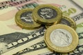 Pile of one pound coins on top of 50 dollar note. Close up photo, with shallow depth of field. Concept for currency exchange, Royalty Free Stock Photo