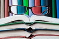 On open books lie glasses concept Royalty Free Stock Photo