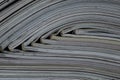 Pile of open magazines without texts seen from the side Royalty Free Stock Photo