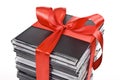 Pile of optical disc with red ribbon Royalty Free Stock Photo