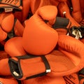 Pile of orange boxing gloves