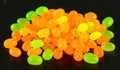 A pile of orange and green jelly beans Royalty Free Stock Photo