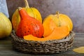 Pile of orange harvested pumpkins on wooden table, retro toned Royalty Free Stock Photo