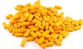 Pile of orange pills Royalty Free Stock Photo