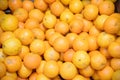 Pile of oranges, freshly produced with imperfections on the skin