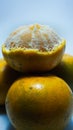 a pile of oranges, some of which are already open. isolated on a white background. in the photo straight parallel to the object Royalty Free Stock Photo