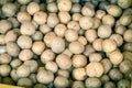 Full background view Asian baby potatoes in plastic crate at market stand in Little India, Singapore Royalty Free Stock Photo