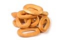 Pile of oval bagels on white background