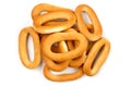 Pile of oval bagels on white background. Top view.