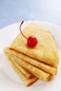 Pile pancakes with cherries Royalty Free Stock Photo