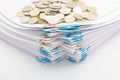 Pile of paperwork with colorful paperclip have stack gold coins Royalty Free Stock Photo