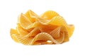A pile of pasta shells on a white surface, great for food or culinary concepts Royalty Free Stock Photo