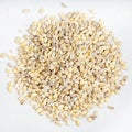 Pile of pearled barley grains close up on gray Royalty Free Stock Photo