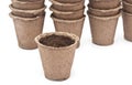 Pile peat pots for growing seedlings