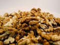 Pile of Peeled Walnuts on White Background. Royalty Free Stock Photo