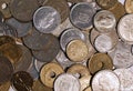 Cenital view of a pile of peseta coins with white background