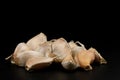 Pile piece of fresh garlic group ingredient isolated on black background