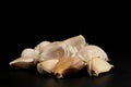 Pile piece of fresh garlic group ingredient isolated on black background