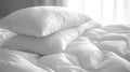 A pile of pillows sitting on top of a bed covered in white sheets Royalty Free Stock Photo