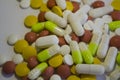 Pile of pills, tablets, capsules of different colors