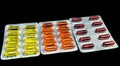 Pile of pills and vitamins in blister packs with copy space. Medical pharmacy concept. Selective focus Royalty Free Stock Photo