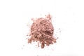 Pile of pink cosmetic clay on white