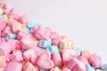 Pile of Pink Heart Shaped and Pastel Color Flower Shaped Marshmallow Candies with Free Space for Design or Text Royalty Free Stock Photo
