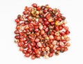 Pile of pink peppercorns Baie rose on gray Royalty Free Stock Photo