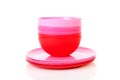 Pile of pink plastic plates and bowls Royalty Free Stock Photo