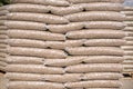 Pile of plastic bags full with wooden pellets Royalty Free Stock Photo