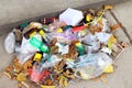 Pile of plastic garbage on the floor, garbage plastic waste glass and straws, plastic bag waste, plastic bottle drink waste trash