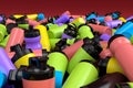 Pile of plastic sport shaker for protein drink on white background