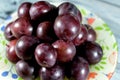 pile of plum fruit, A fruit of some species in Prunus subg. Prunus, dried plums are most often called prunes, stack of fresh rose