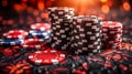 A pile of poker chips with a red and white design on them. The chips are stacked on top of each other and there are several of