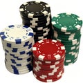 Pile of poker chips in various colors isolated on white background Royalty Free Stock Photo