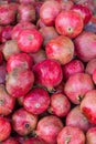 Pile pomegranates in the box at the market