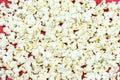 A pile popcorn on red background Royalty Free Stock Photo