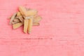 pile potato dry pink wood background. rotten