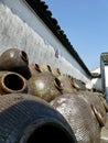 Pile of pottery rice wine jugs. Wuzhen, Tongxiang, China. Royalty Free Stock Photo