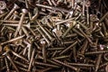 Pile of pozidriv head type screws, with a blurred background Royalty Free Stock Photo