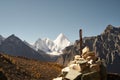 Pile of prayer stones in front of mount jampayang in yading national park, china