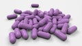 Pile of purple medicine capsules