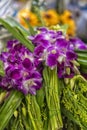 Pile of purple orchid flowers stacked Royalty Free Stock Photo