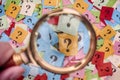 Pile of question marks and magnifying glass Royalty Free Stock Photo