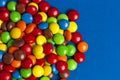 Pile of Rainbow Colored Candy Coated Chocolate Buttons Royalty Free Stock Photo