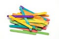 Pile of rainbow colored popsicle sticks